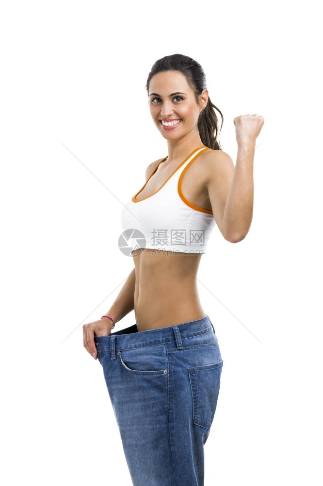 拉丁腰部围在饮食概念中穿大牛仔裤的妇女图片