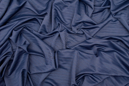 流动的蓝沙面纺织品背景版税图片