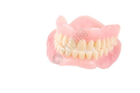 牙周病学放白色背景上孤立的全套丙烯菊假牙颚图片