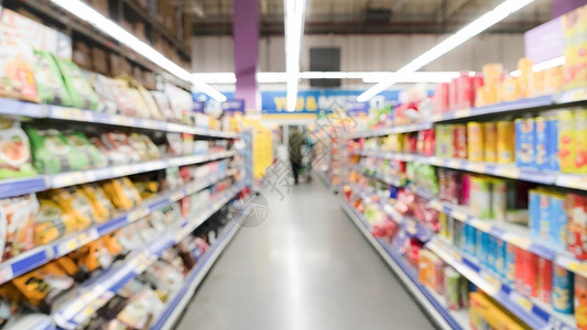 超市百货商场的广视模糊运动消费者吸引人的食物图片