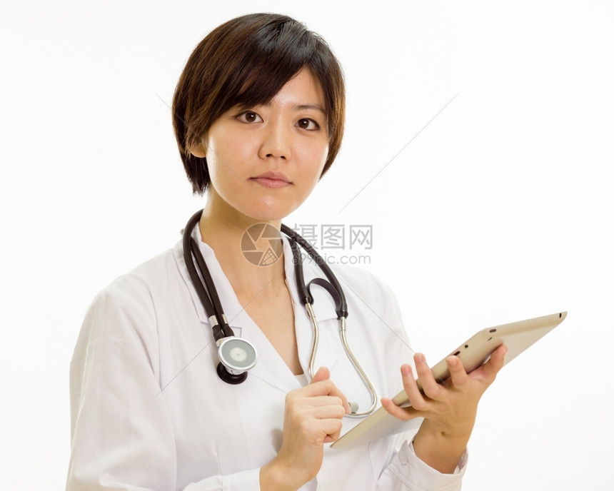 数字的外套女医生配有平板电脑照相机的女医生肯尼图片