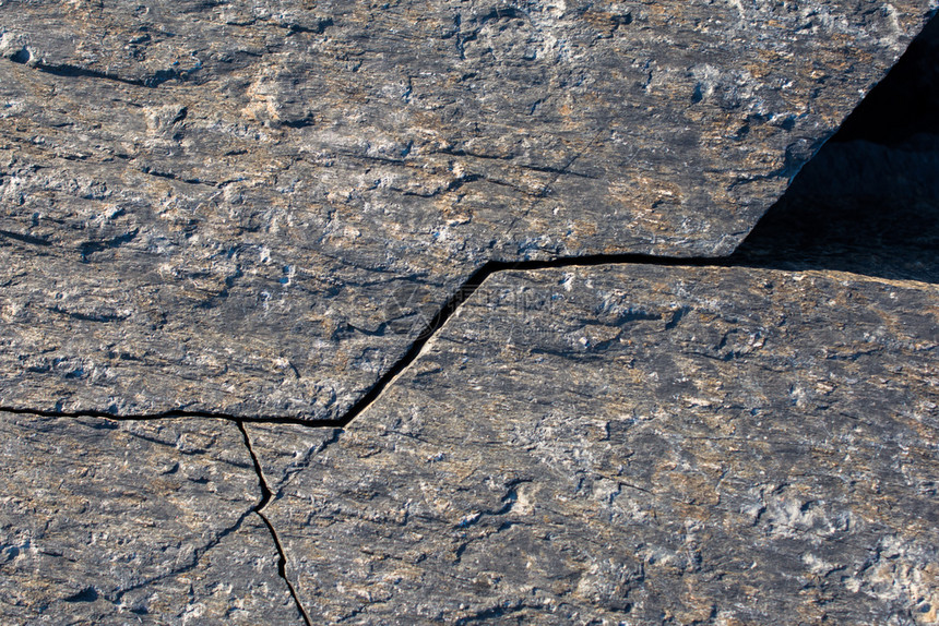 质地自然岩石或表面作为背景纹理粗糙的抽象图片