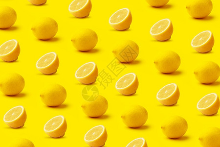 健康热带黄色背景上的柠檬图案黄色图片