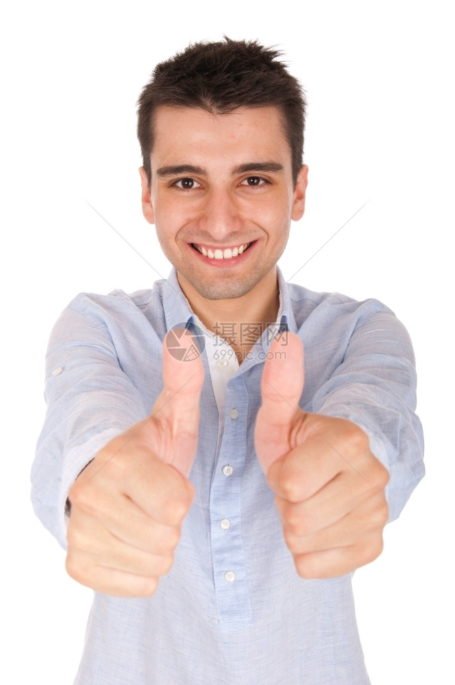 成功年轻的笑年轻随身男子展示拇指举起标志在白色背景上被孤立快乐的图片