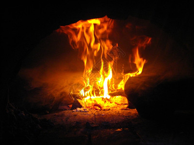 火柴在炉中燃烧阐明煤火焰图片