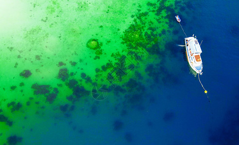 锚定的色由无人驾驶飞机空中观测的珊瑚礁上船清除设计图片