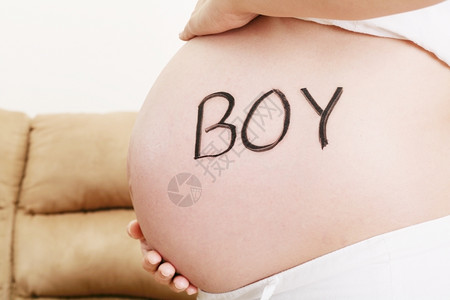 WordBoy写在怀孕肚子上女士母亲人类图片
