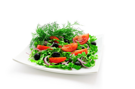 蔬菜沙拉番茄生橄榄和绿自然维生素的图片
