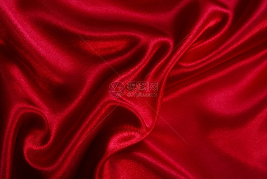 胭脂海浪纺织品平滑优雅的红色丝绸可用作背景图片