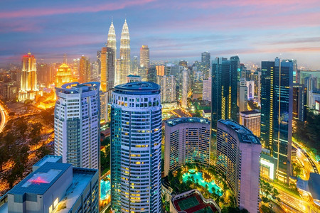 著名的马来西亚日落时首都吉隆坡市中心天际城风景亚洲目的地图片