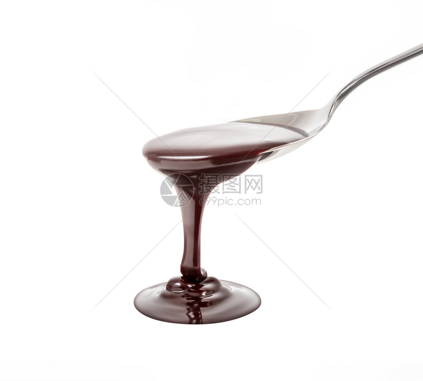 可口浇注巧克力糖浆倒在勺子上煮饭烘烤降低图片