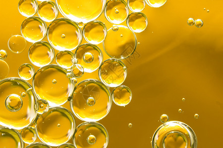 玻璃金黄泡油抽象背景明亮的实验室图片