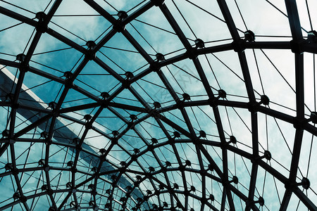 蓝色的屋顶现代玻璃建筑结构详细图象SM工业的背景图片