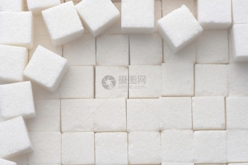 白色糖块的密闭粒状立方体饮食图片
