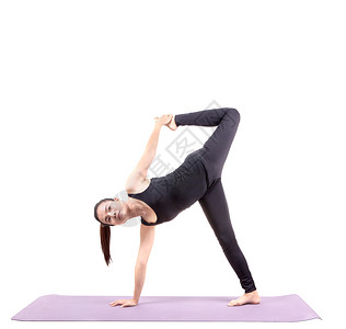 温泉讲师孤立白背景的女年青子瑜伽练习专业的图片