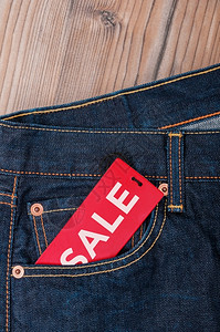 售完纸笔记BlueJeans袋中带有销售标牌的红色记使用复制空间零售设计图片