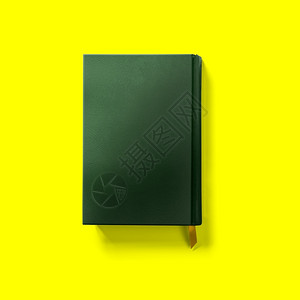 疏散知识干净的回到学校概念硬封面暗绿色书在黄上被隔绝关闭图片