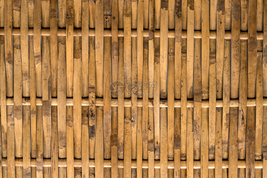 编织泰国民间艺术的竹布墙质地建造老的图片