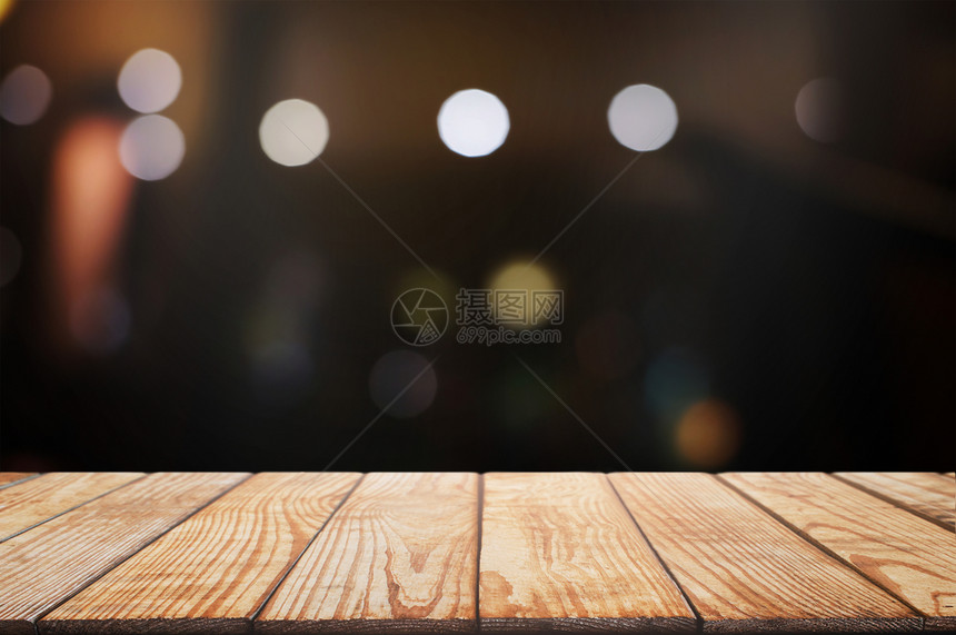 内部的散景餐饮咖啡厅背中模糊的夜光上空木板桌最佳图片