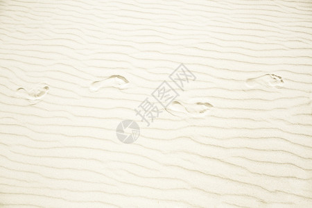 白色的近距离观察水浪形成的彩色条纹沙背景暑假海上日概念以及风波浪状的图片