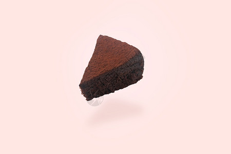 巧克力蛋糕上浮粉红色背景上顶有可粉的巧克力蛋糕食物生日假期图片