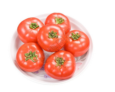 红新鲜西番茄在菜盘中以白色背景隔绝农业植物盘子图片