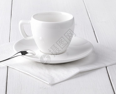 酒吧白餐巾纸上的空咖啡杯肮脏的垫背景图片