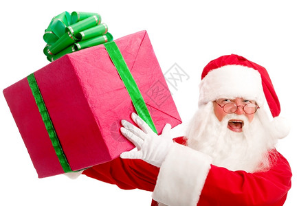 垂直的白色圣誕節大禮物持著聖誕在白色背景的手裡照片來自上方颜色背景图片