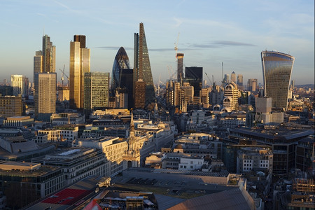 主教门诺曼伦敦金融区在日落时的景象提高塔图片