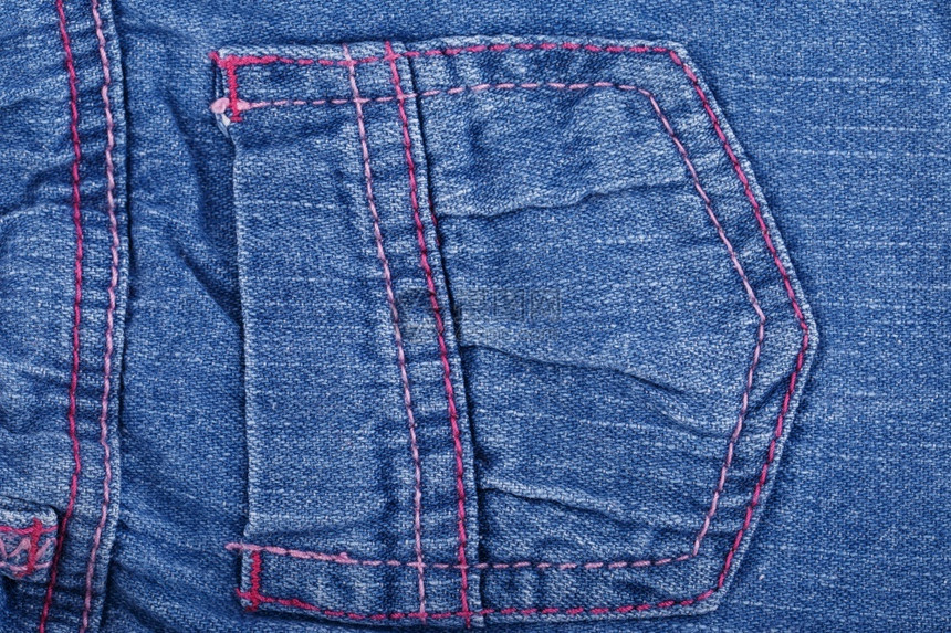洗过特写牛仔布蓝色裤口袋结构体有质感的图片