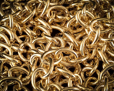 手镯金链的纹理堆积黄金链的有选择焦点结构堆积金链的有选择重点礼物珠宝图片