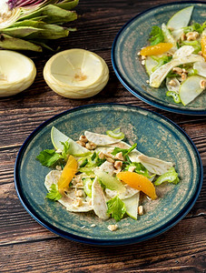 新鲜的橄榄美食配有橙子和栗的鲜奶椰沙拉图片