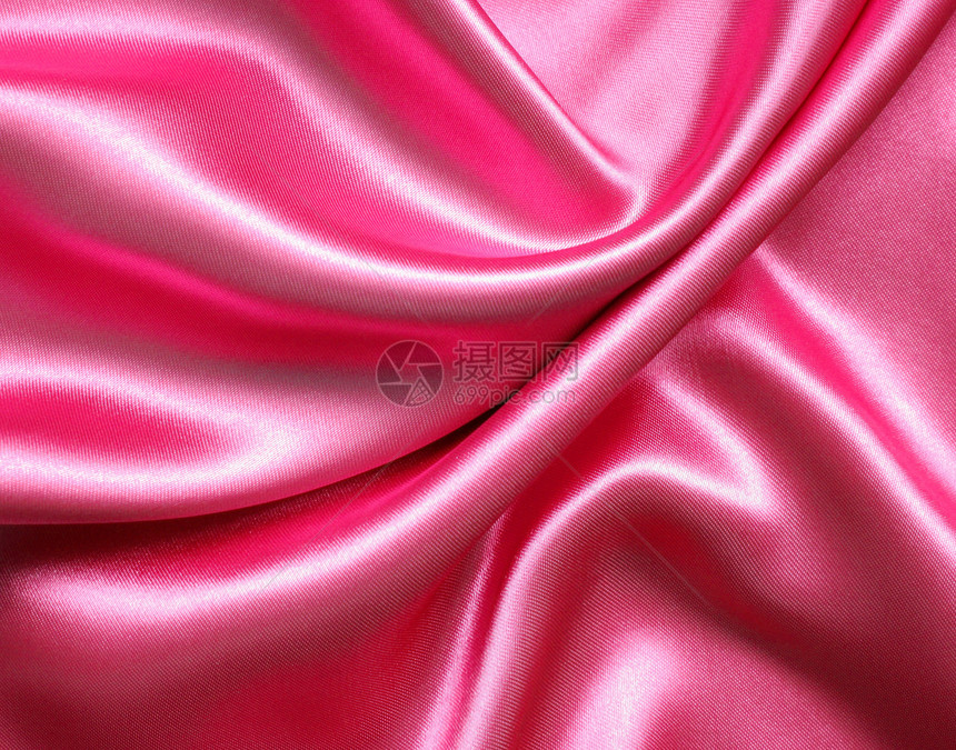 黑暗的平滑优雅粉色丝绸可用作背景海浪感图片
