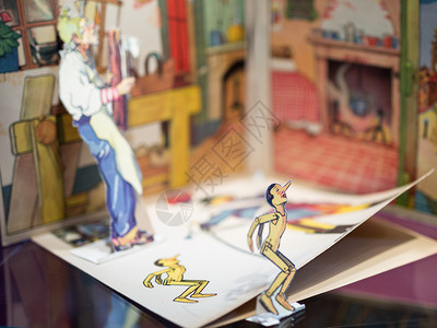 喜悦老的艺术古色香儿童画册木偶奇遇记由Collodi背景