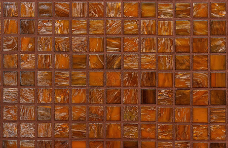 建筑学橙色和棕混合闪亮玻璃马赛克丰富多彩的装饰图片