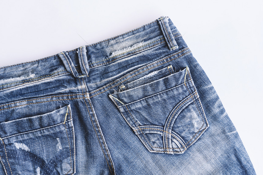 质地时髦的戴尼姆蓝牛仔裤纹身的背面口袋缝合细节图片