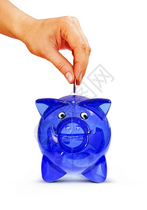 投资金融的女人用手把硬币放进小猪银行白与路隔绝现金图片