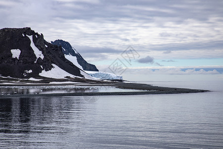 南极洲冷海边缘有白冰川的山峰霜岬角网络背景图片