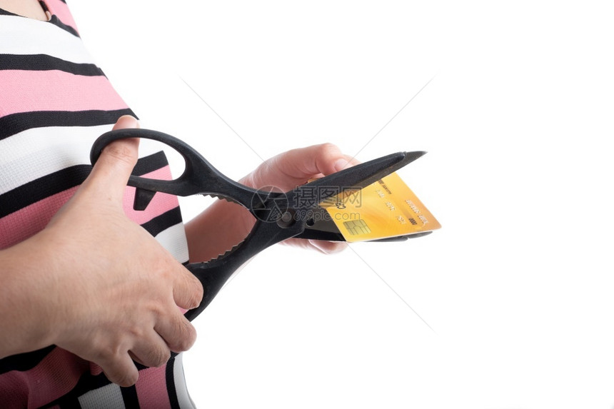 帐户切剪刀的信用卡以停止白种背景购物消费而不再花在白种背景购物上黄色的白图片