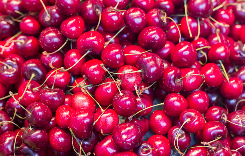 可口团体美食成熟的红新樱桃作为背景图片