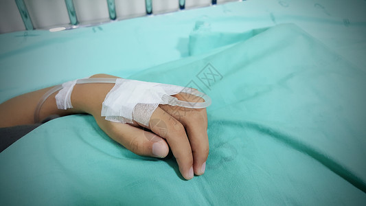 吊针躺在医院床上的病人背景