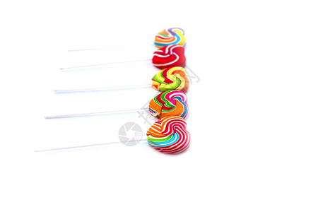 假期天甜糖心形颜色满白背景彩虹棒糖的果情人节礼物爱概念插图图片