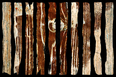 棕色木板表面上有锯成的油漆层是旧木板的实际纹理皱巴的真实老图片