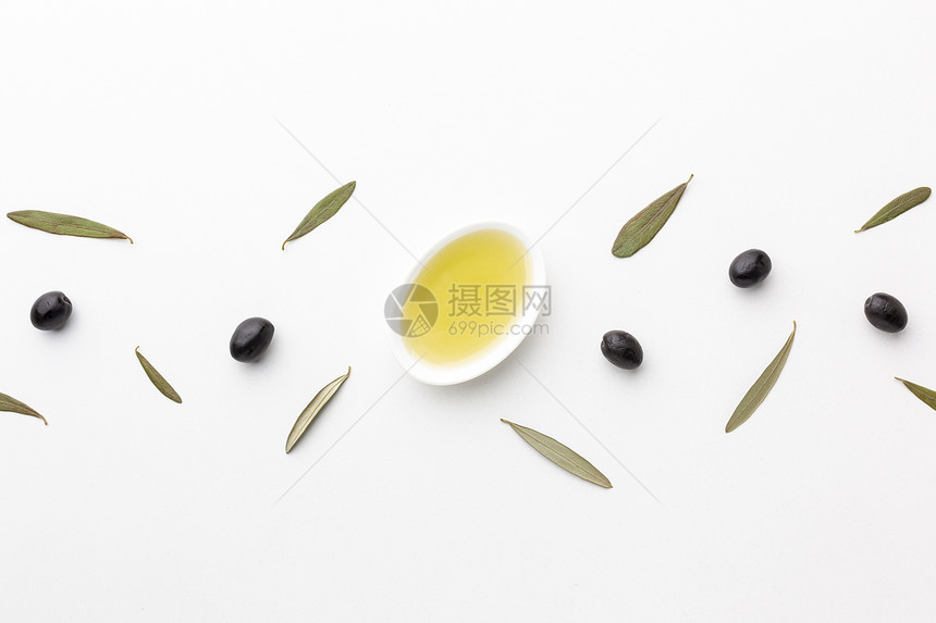 高的平面橄榄油锅有叶子黑色橄榄分辨率和高品质优美的相片平板棕色橄榄油锅有叶子黑橄榄优质美丽的照片概念动物维他命图片