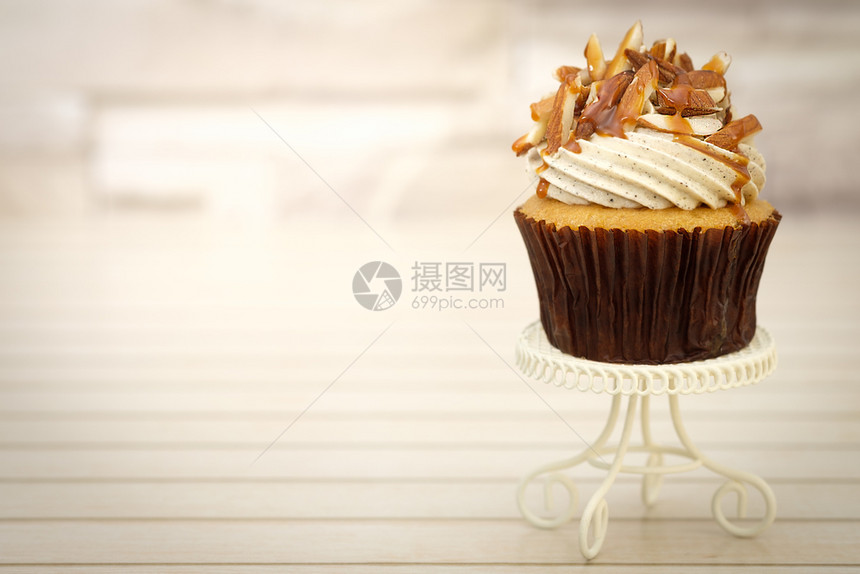 奶油自动对焦Cupcake饼的装饰美极了光亮明AF点选择杏仁图片