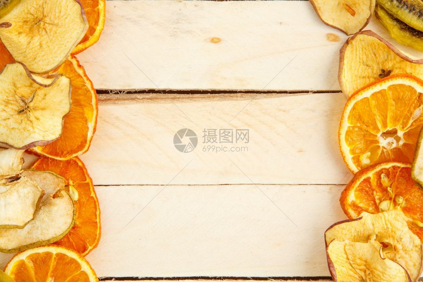 墙纸木背景顶视图上的干苹果和橘子橙假期图片