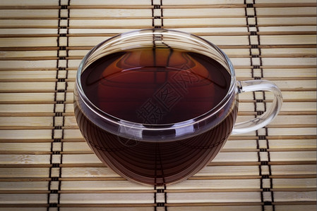 食物木制背景的茶杯点概念的图片