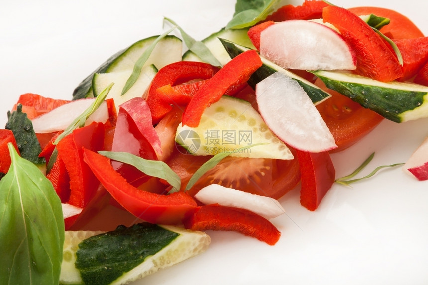 面包白色的小吃盘子上彩色新鲜蔬菜的特餐沙拉图片