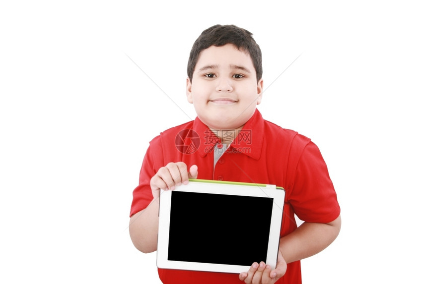 网上冲浪放松年轻男孩手持电脑平板在白色上与世隔绝触摸屏图片