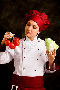 自信的控制番茄质量年轻女厨师照片平坦的帽子图片
